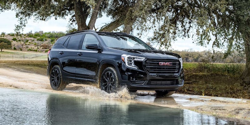 2022 GMC Terrain driving through a puddle